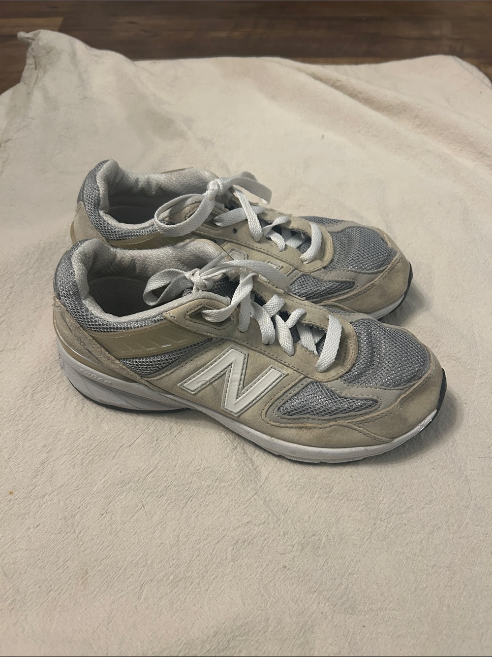 New Balance kids Light Gray and Cream Athletic Sneakers
